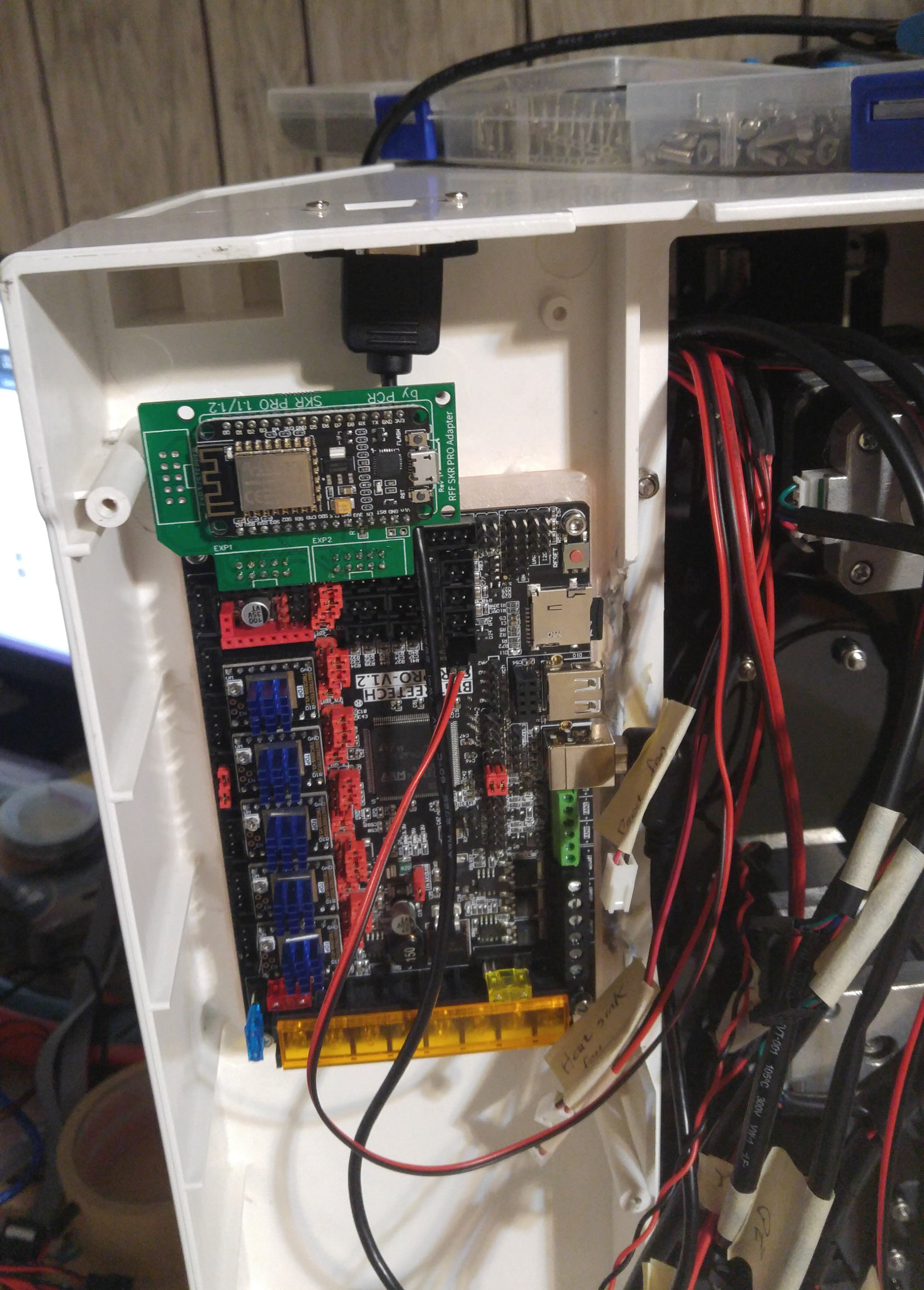 The board mounts on its bracket with its USB port and micro-SD card slot facing the center of the printer